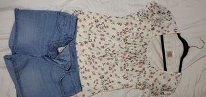 Pink floral blouse with light wash jean shorts